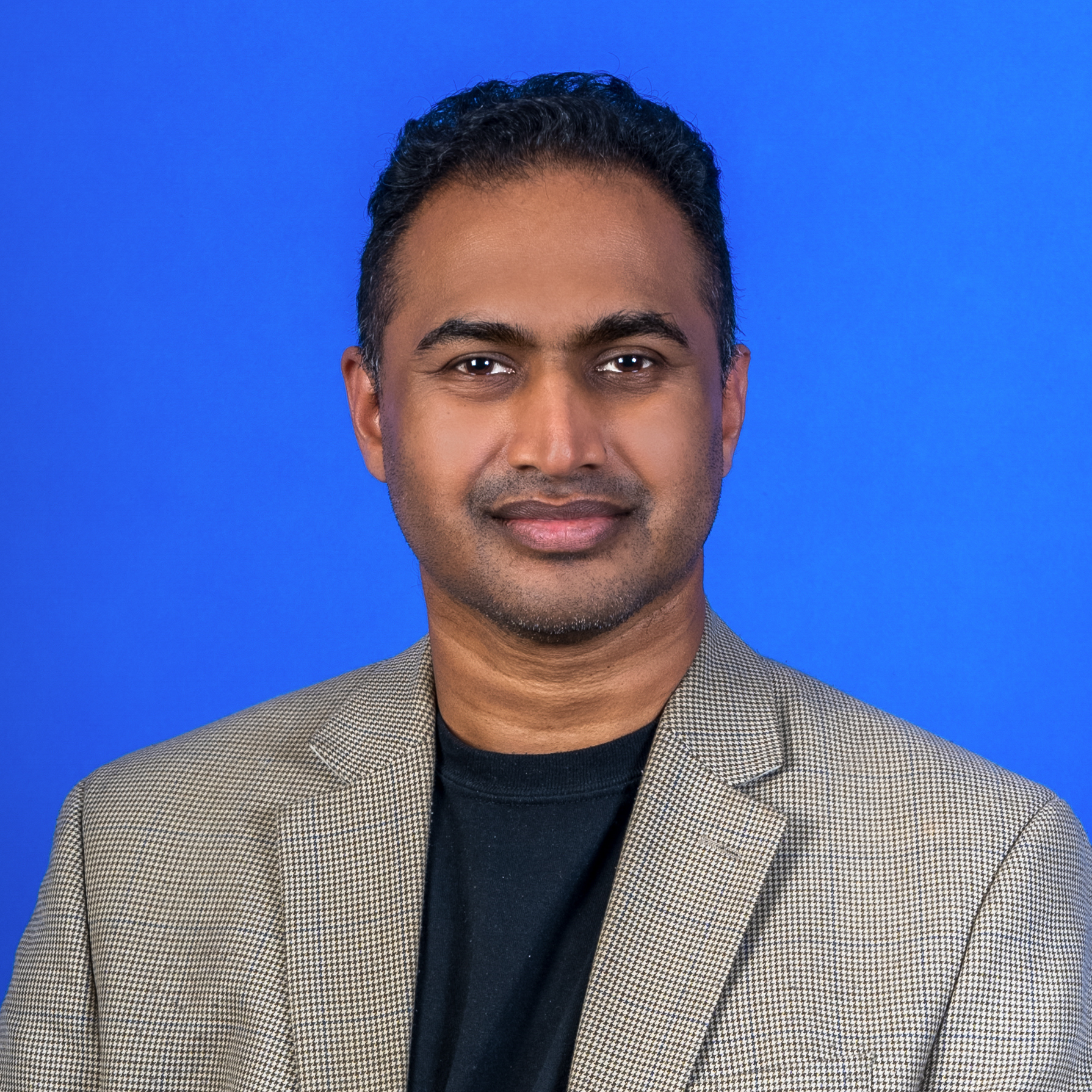 Headshot of Ashok Karra