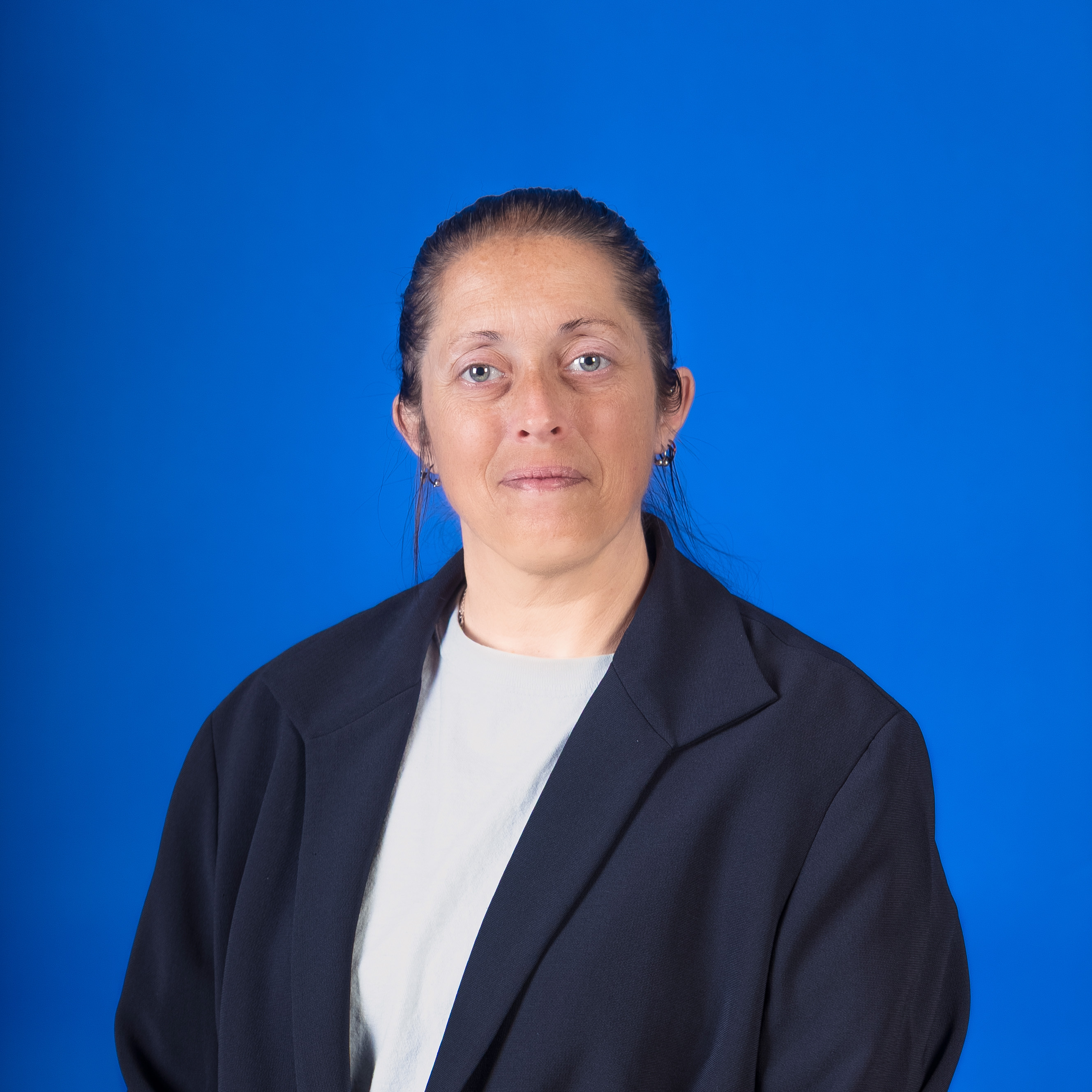 Headshot of Patricia Shuker
