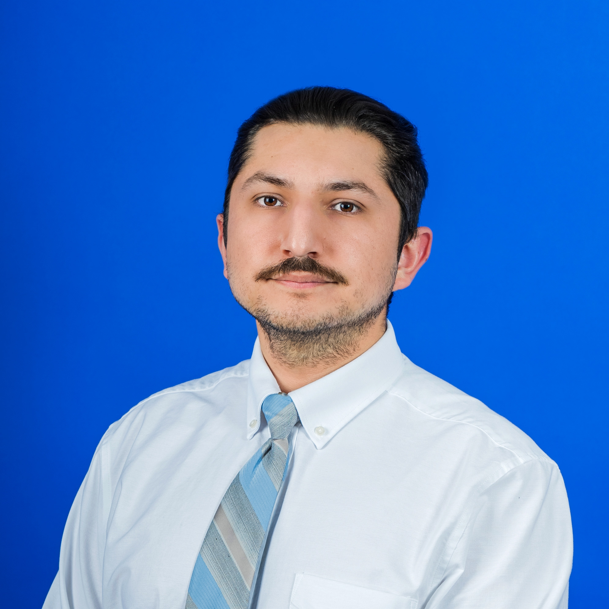 Headshot of Uric Estrada