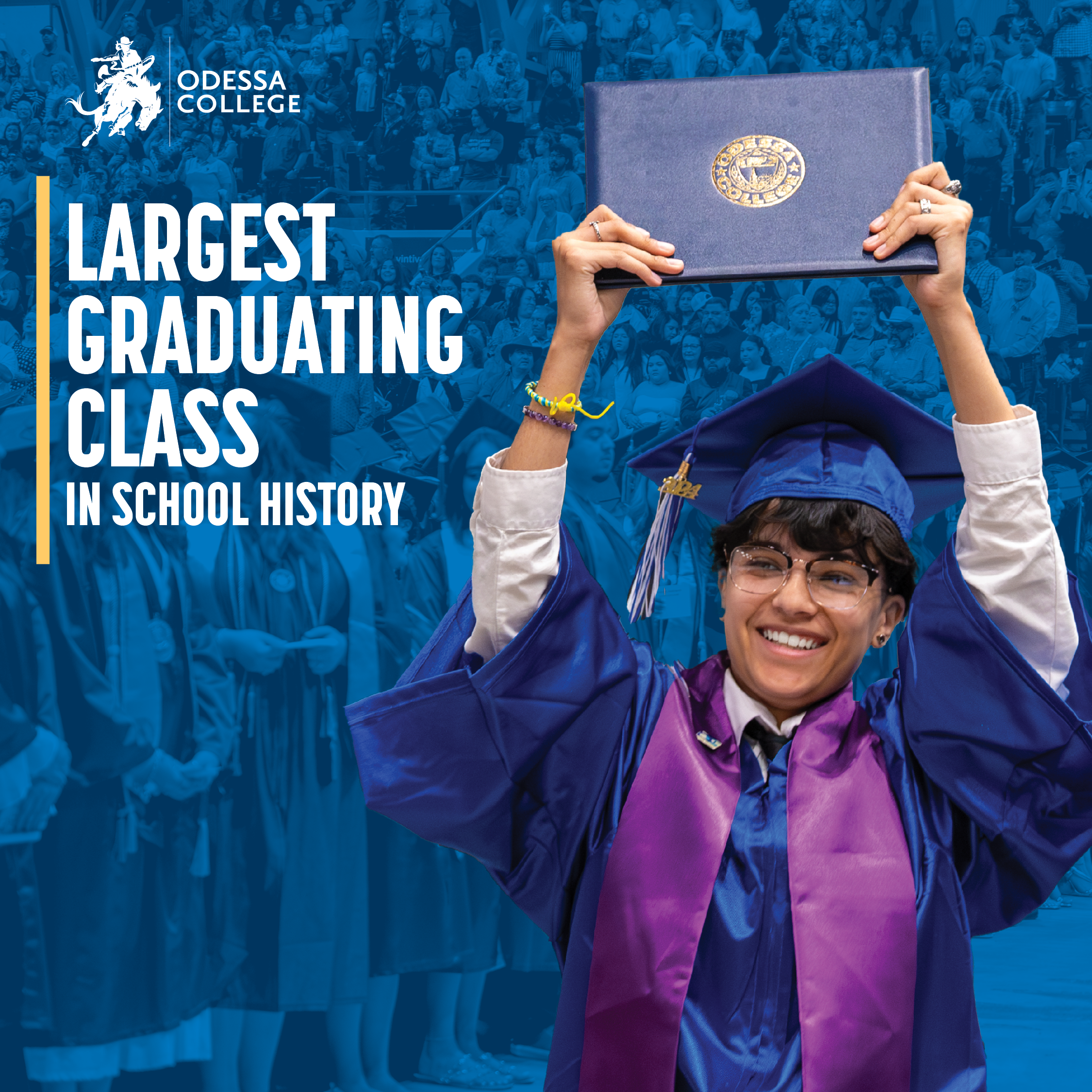 Student holding diploma and smiling