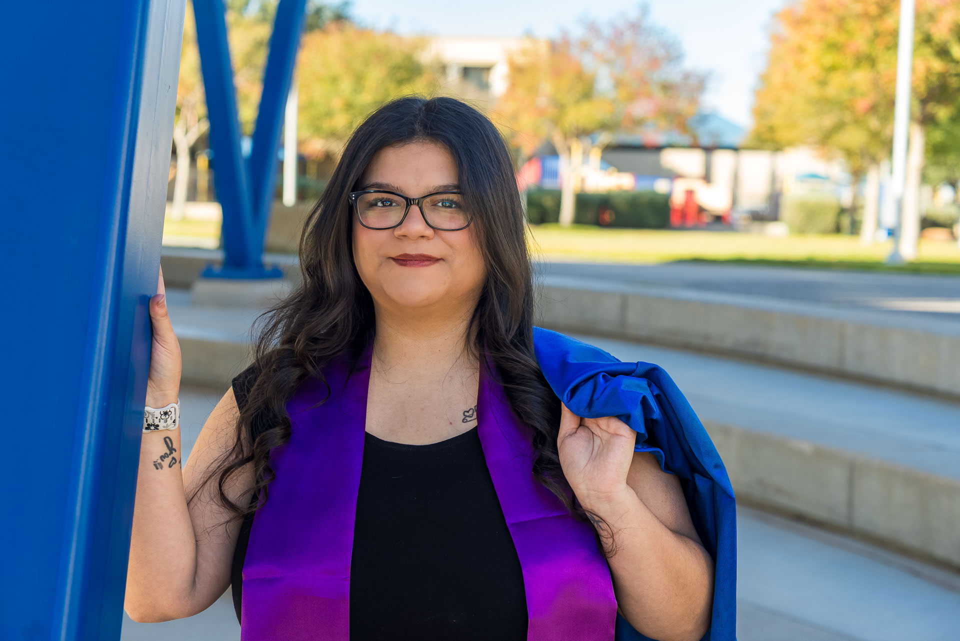 Evangelina Quiroga posing in amphitheater with the robe on her shoulders