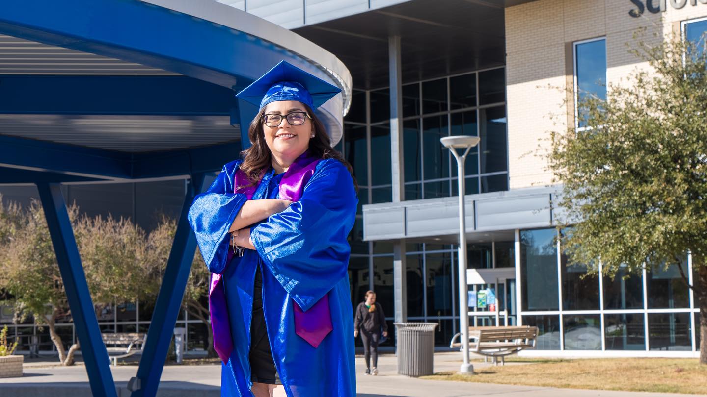Daniela Rivera posing with the Amphitheater behind her