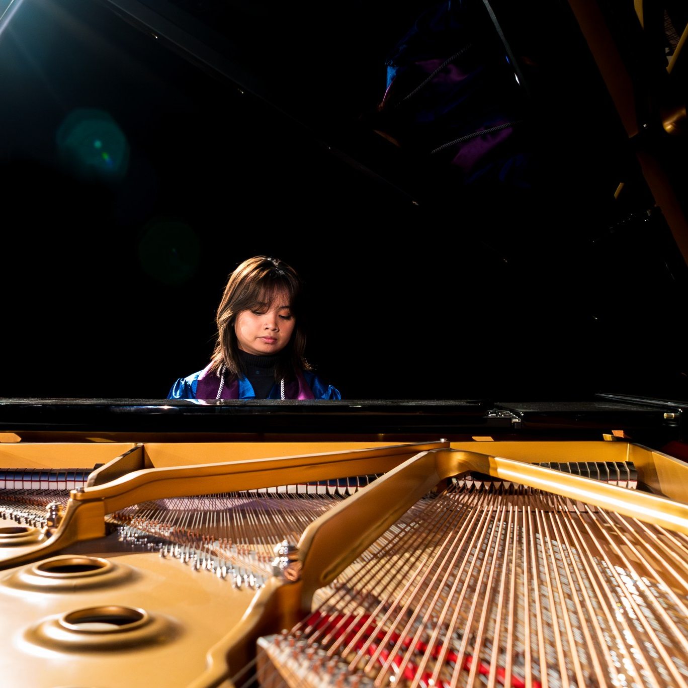 Arabella playing piano