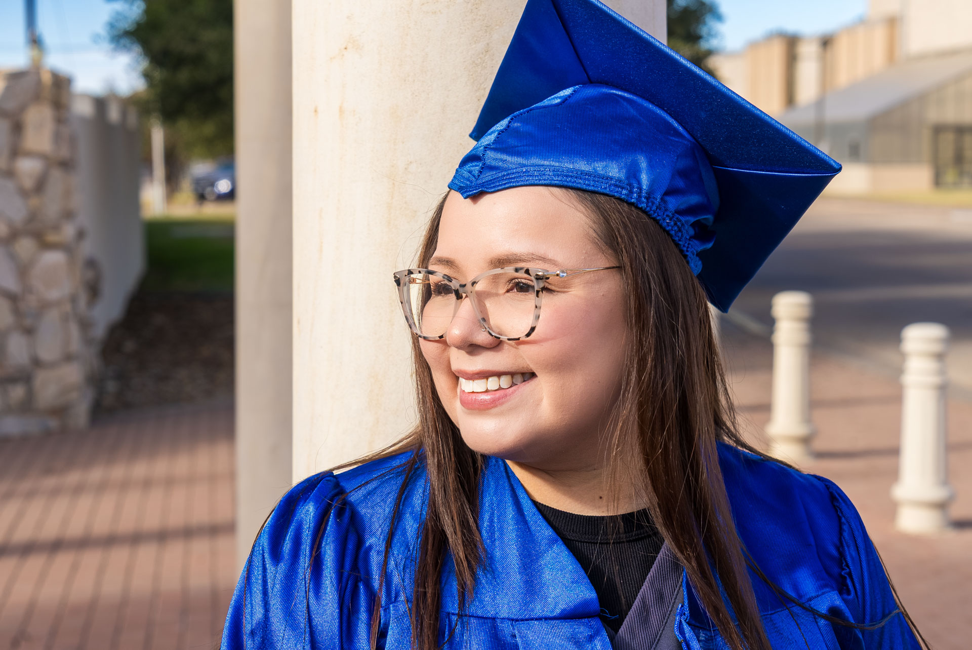 Aide Medina smiling and turning to the side