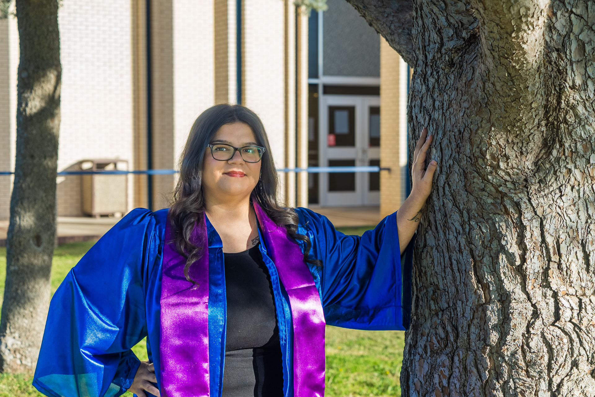 Evangelina Quiroga posing next to a tree