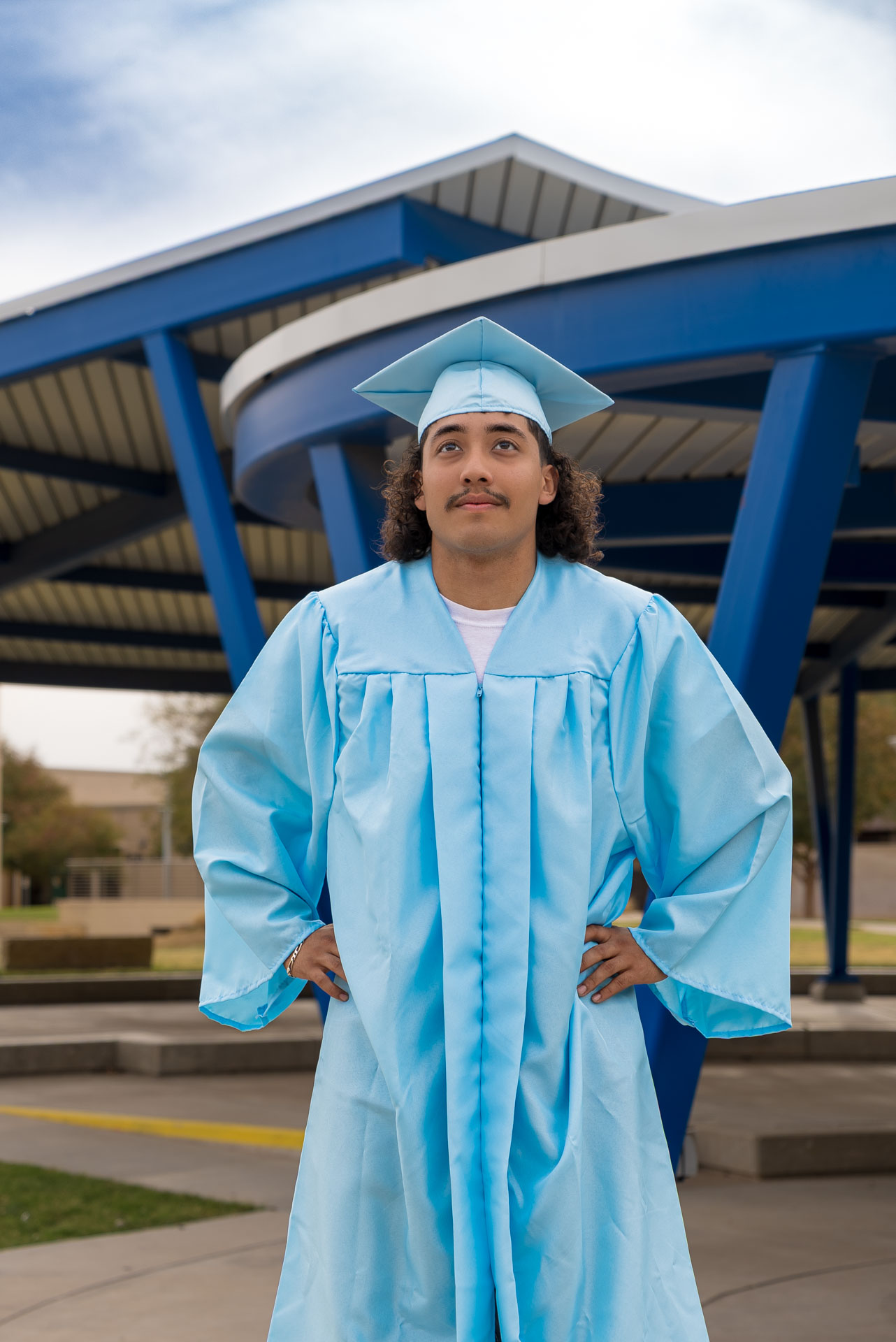 Julien with his hands on his hips