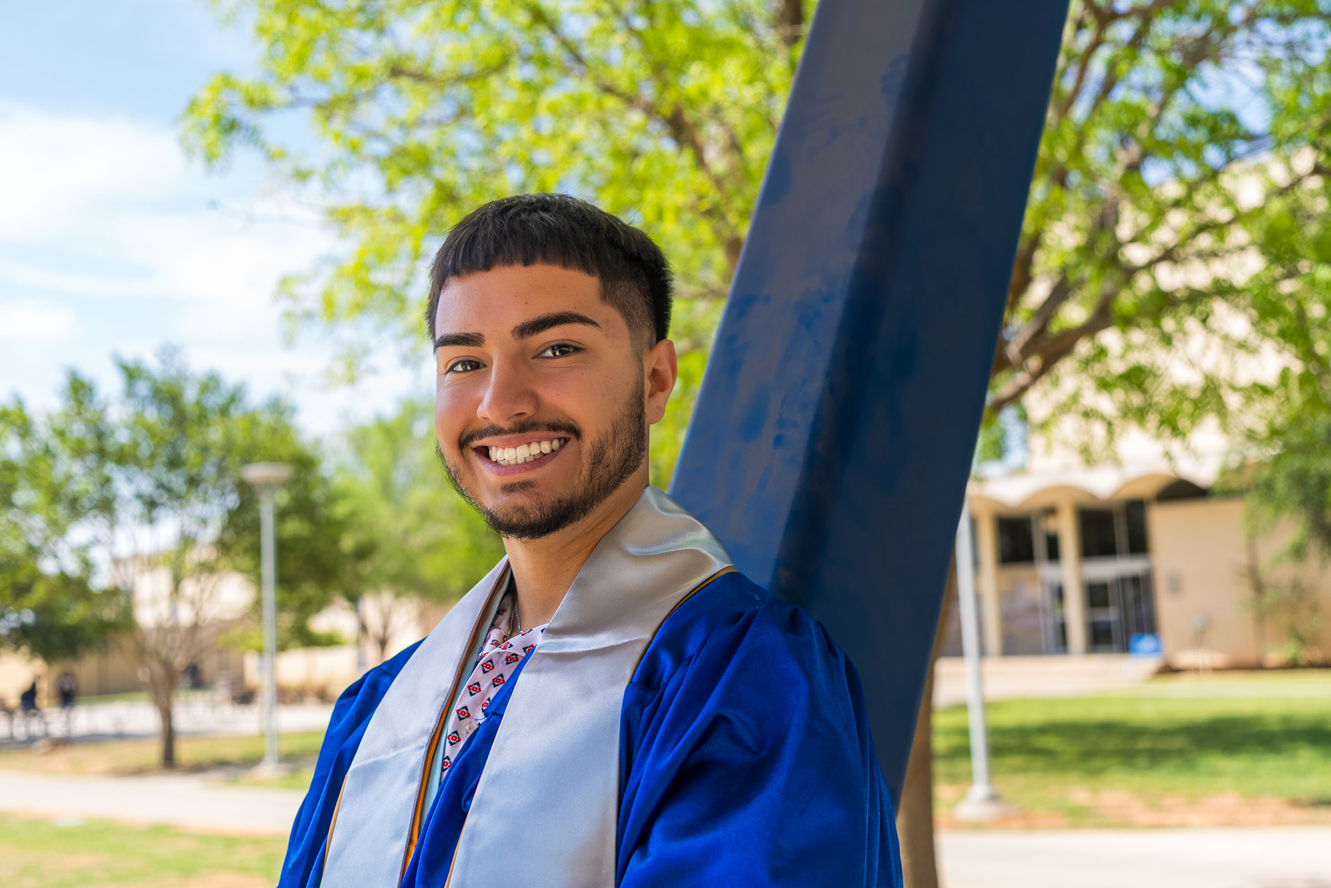 Luis Munoz smiling at amphitheater