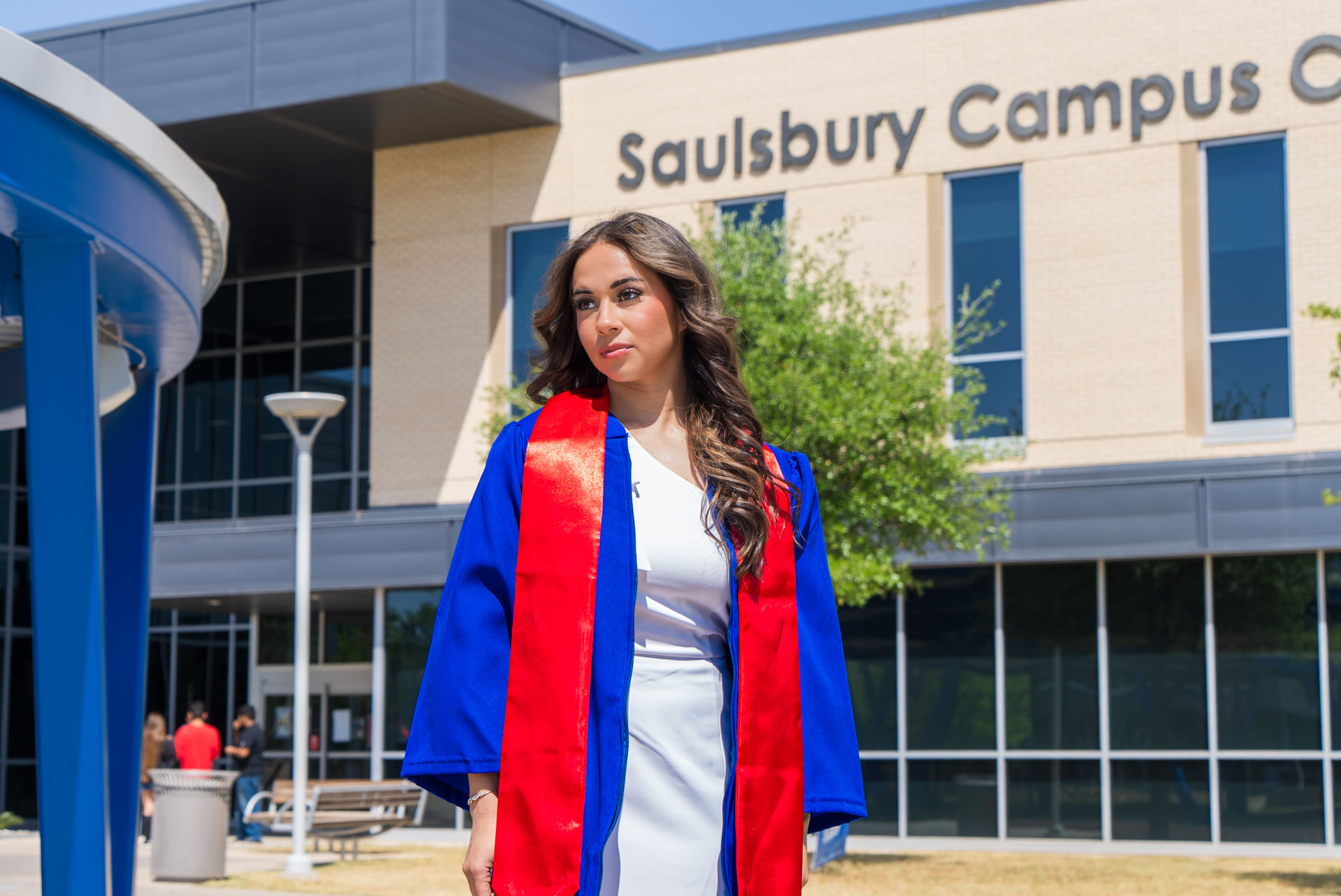 Nevaeh Martinez in front of building