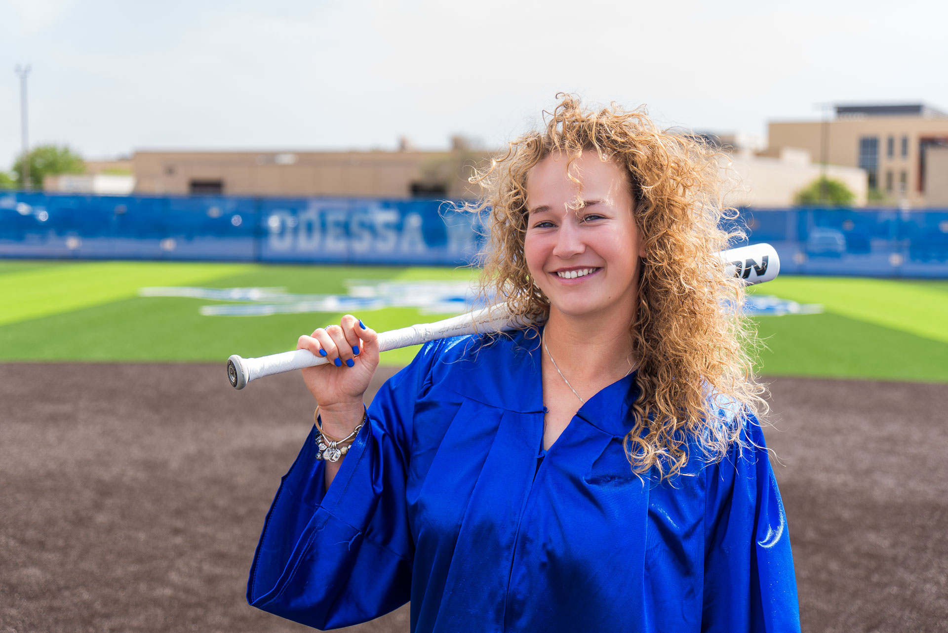 Rens Tellekamp holding bat and smiling