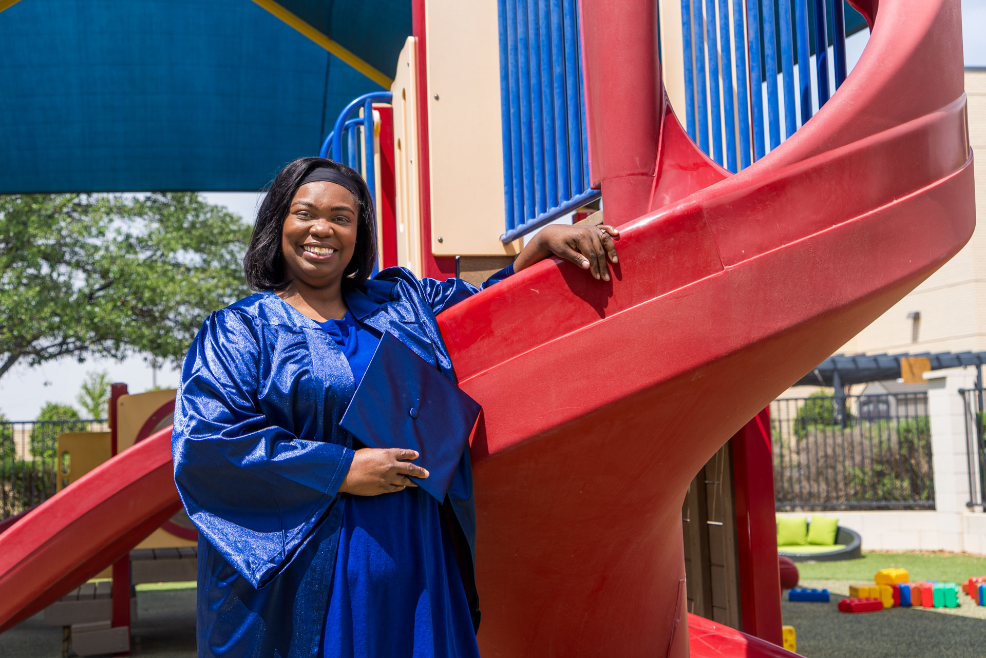 Ruth Watson posing next to a playground slide